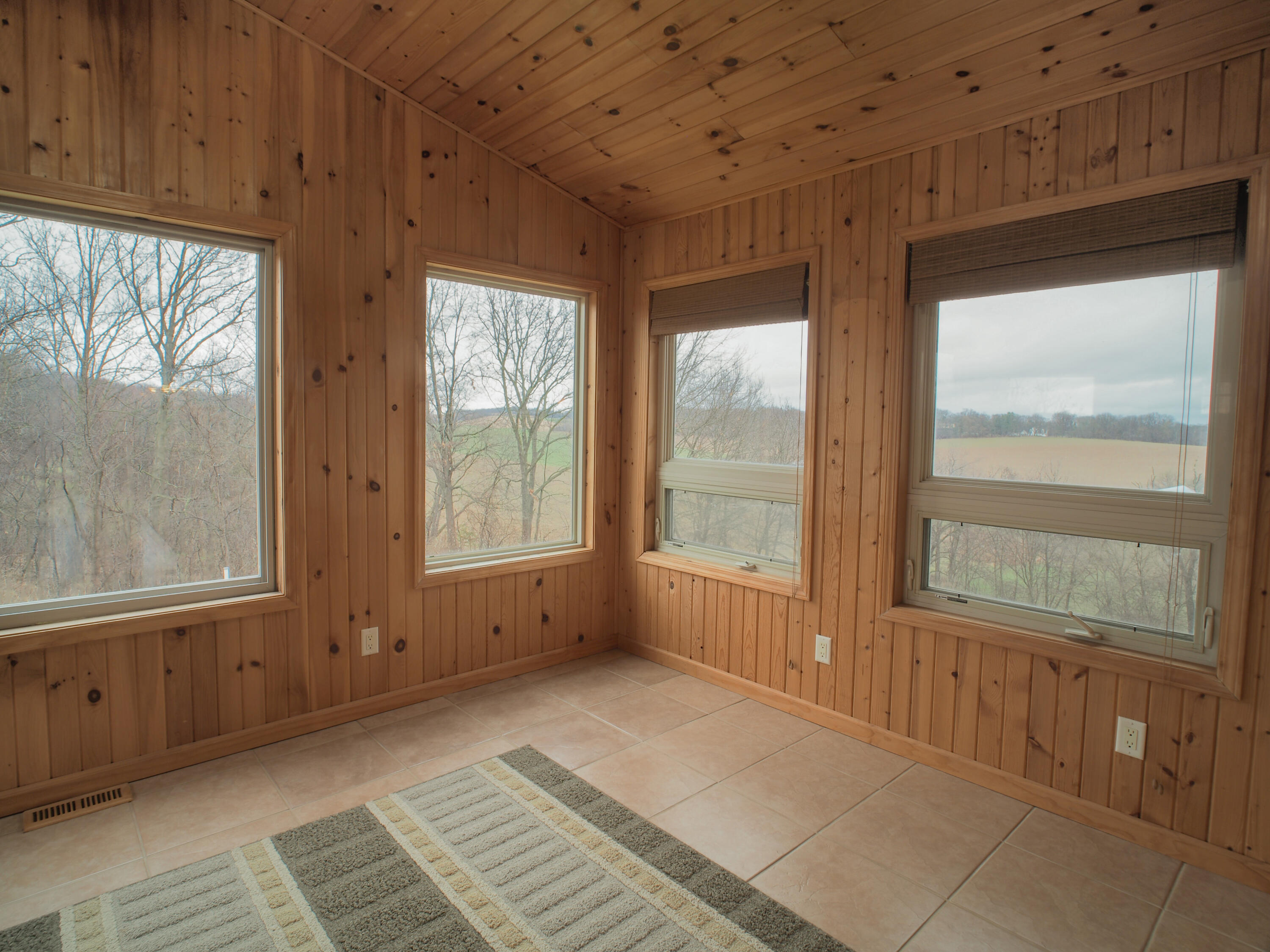 931 Canal Road Waterloo, WI 53594 - Photo 12 of 39 Sunroom with Scenic Views