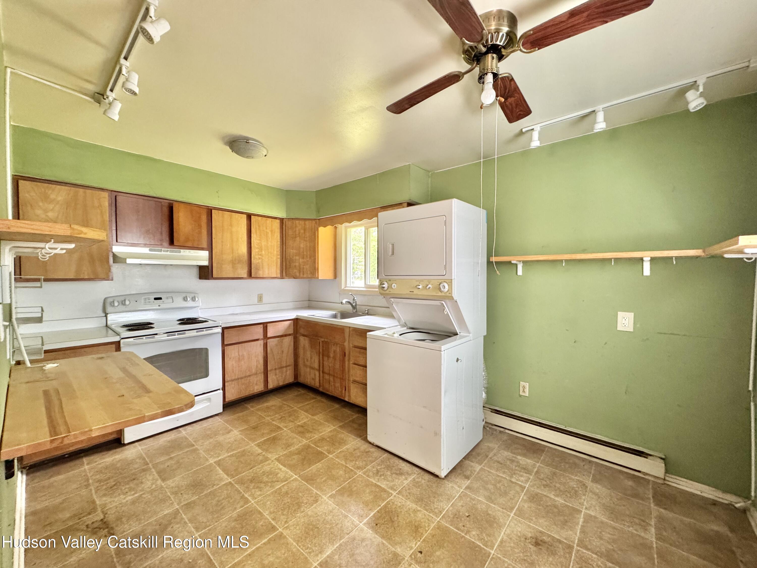 752 Old Rte 23 Acra, NY 12405 - Photo 7 of 25 a kitchen with a sink appliances cabinets and a counter top space