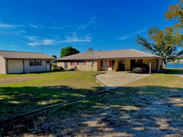 a view of a house with swimming pool