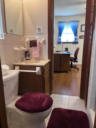 a view of a living room and a sink