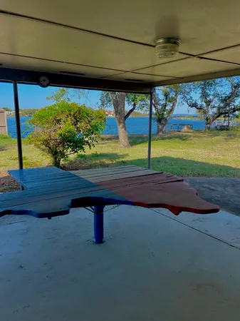 a view of yard with an outdoor seating
