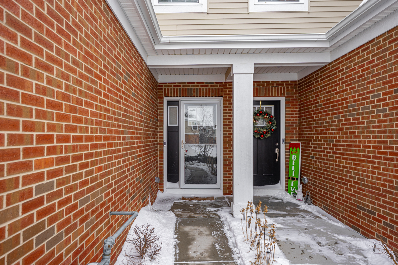 1241 Draper Road McHenry, IL 60050 - Photo 23 of 27 a view of a brick house with a large window
