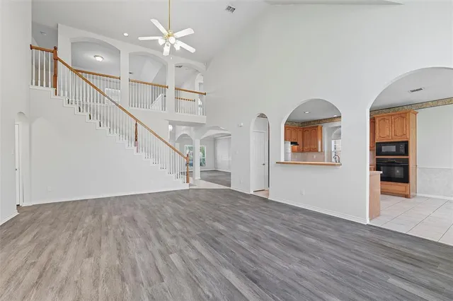 a view of an entryway with wooden floor