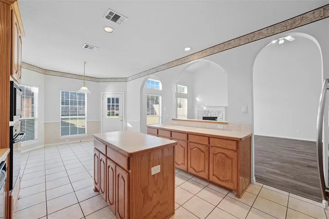 a bathroom with a sink a vanity and a mirror