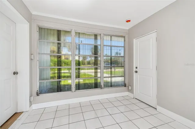 a view of an empty room and window