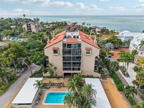 a aerial view of a house with a garden view
