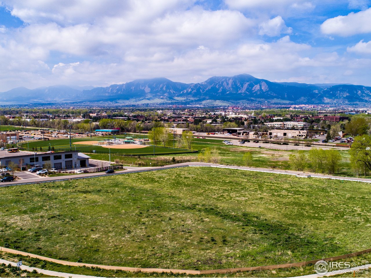 6032 Butte Mill Road Boulder, CO 80301 - Photo 7 of 14 a view of a city with lawn chairs and a big yard