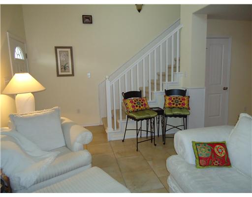 4017 Acushnet Drive Corpus Christi, TX 78413 - Photo 10 of 10 a living room with furniture and a painting on the wall