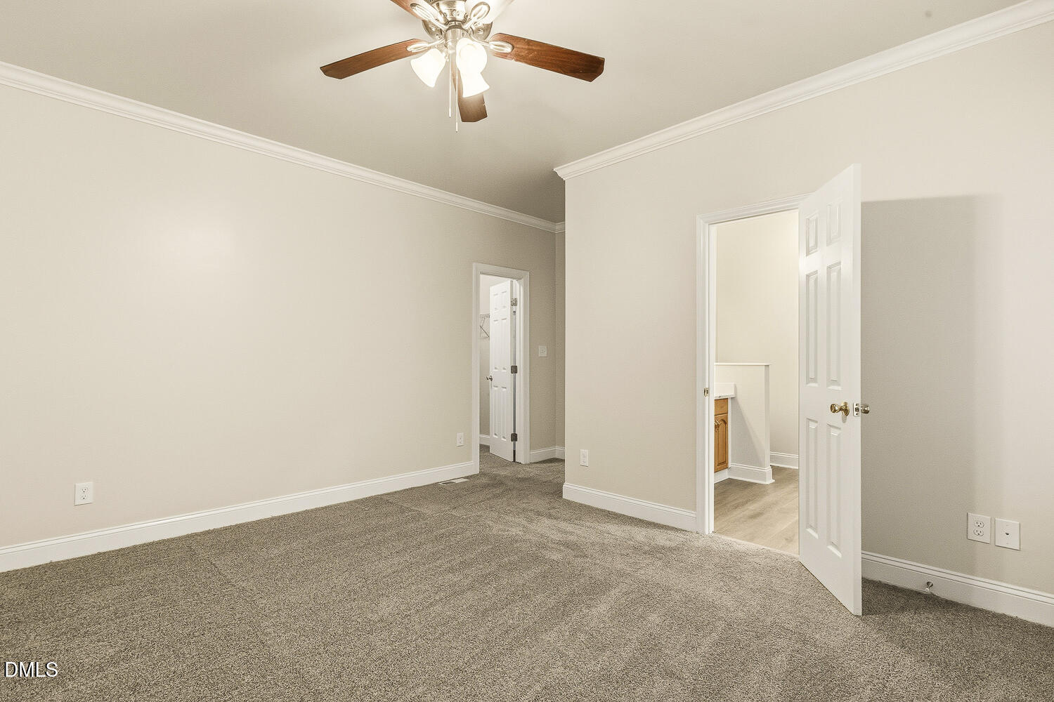 1006 Barnford Mill Road Wake Forest, NC 27587 - Photo 23 of 40 an empty room with closet and a chandelier fan