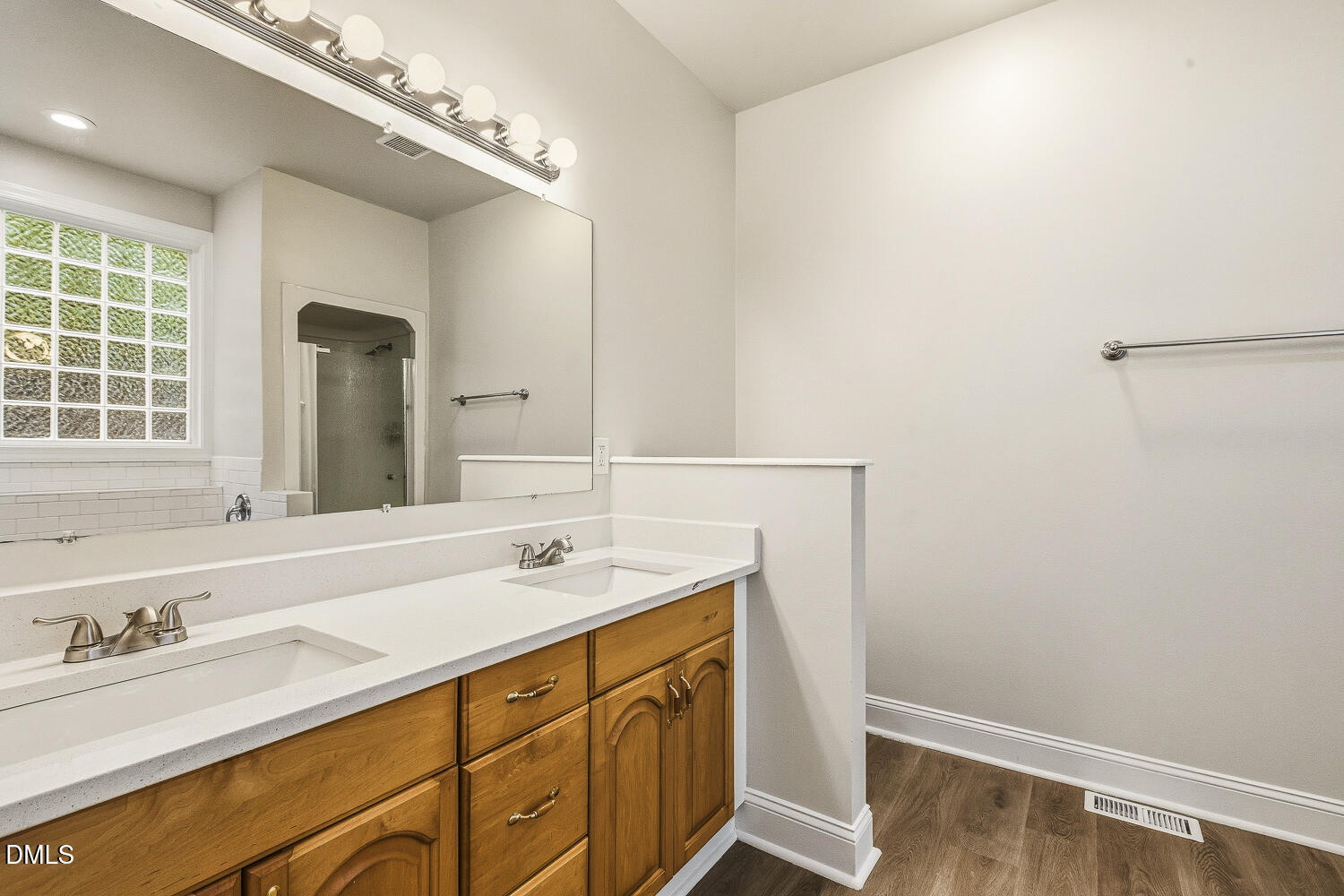 1006 Barnford Mill Road Wake Forest, NC 27587 - Photo 24 of 40 a bathroom with a sink and a mirror