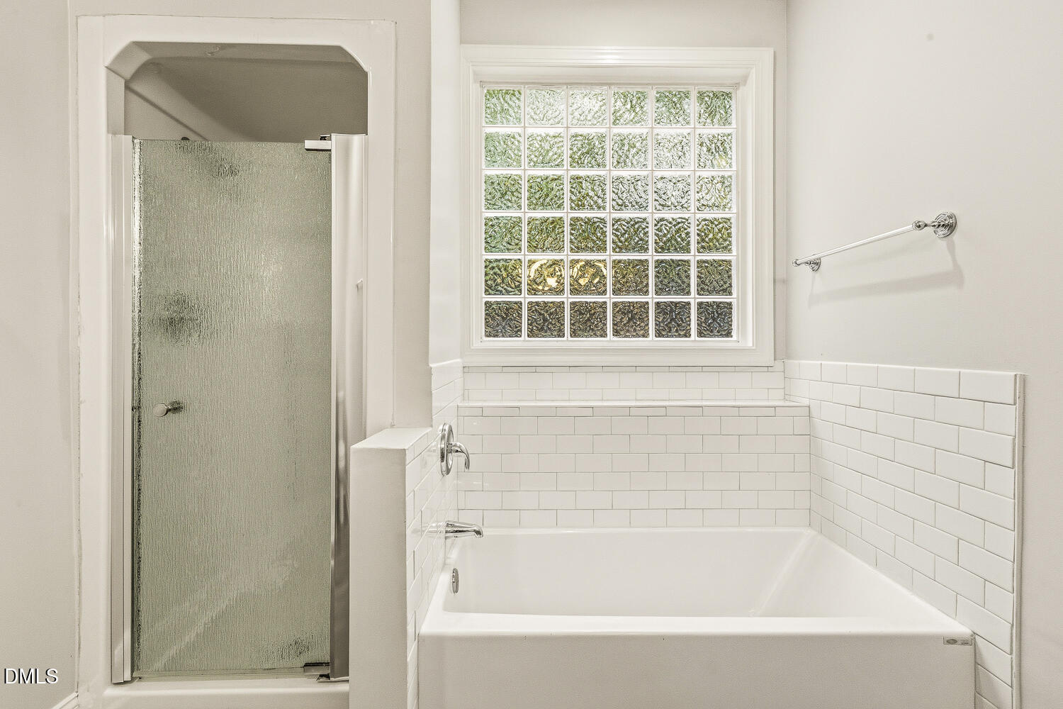 1006 Barnford Mill Road Wake Forest, NC 27587 - Photo 25 of 40 a bathroom with a bathtub