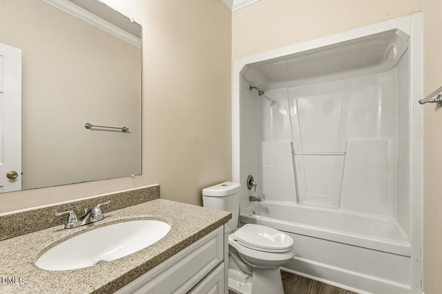 1006 Barnford Mill Road Wake Forest, NC 27587 - Photo 28 of 40 a bathroom with a granite countertop sink toilet a mirror and shower