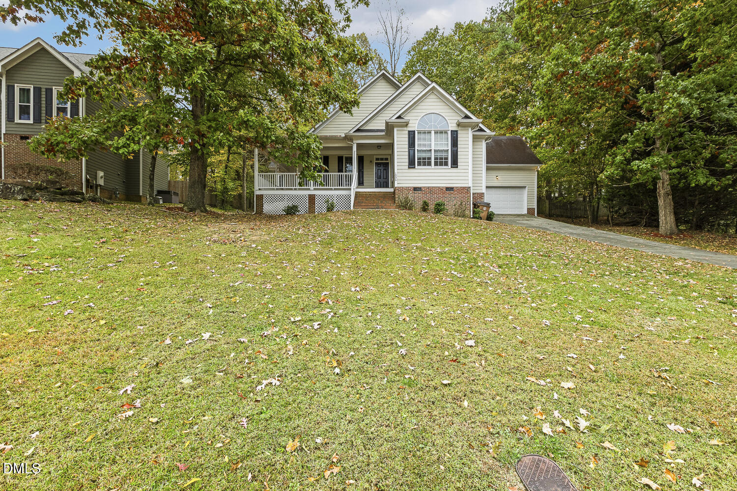 1006 Barnford Mill Road Wake Forest, NC 27587 - Photo 2 of 40 a front view of a house with a garden