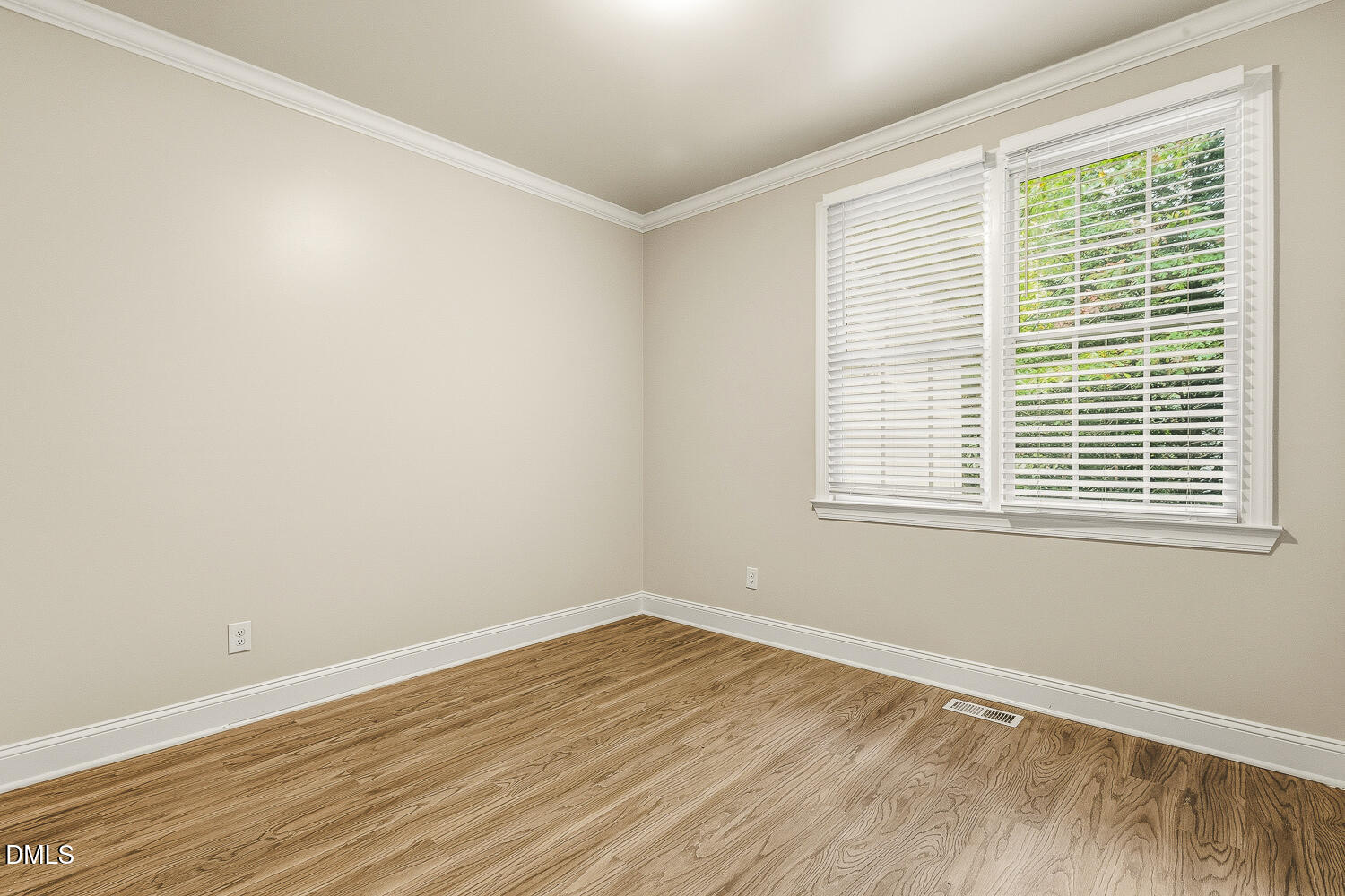 1006 Barnford Mill Road Wake Forest, NC 27587 - Photo 29 of 40 wooden floor in an empty room with a window