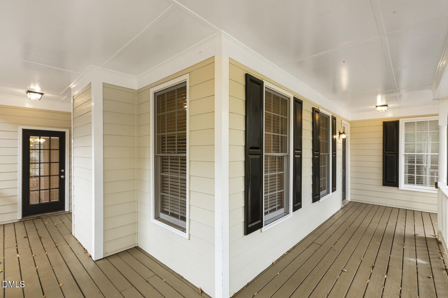 1006 Barnford Mill Road Wake Forest, NC 27587 - Photo 5 of 40 a view of a balcony with wooden floor and door