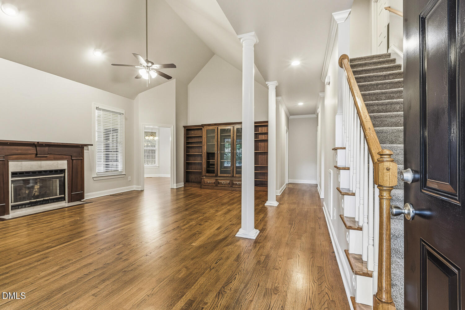 1006 Barnford Mill Road Wake Forest, NC 27587 - Photo 6 of 40 an entryway in a hall with a fireplace
