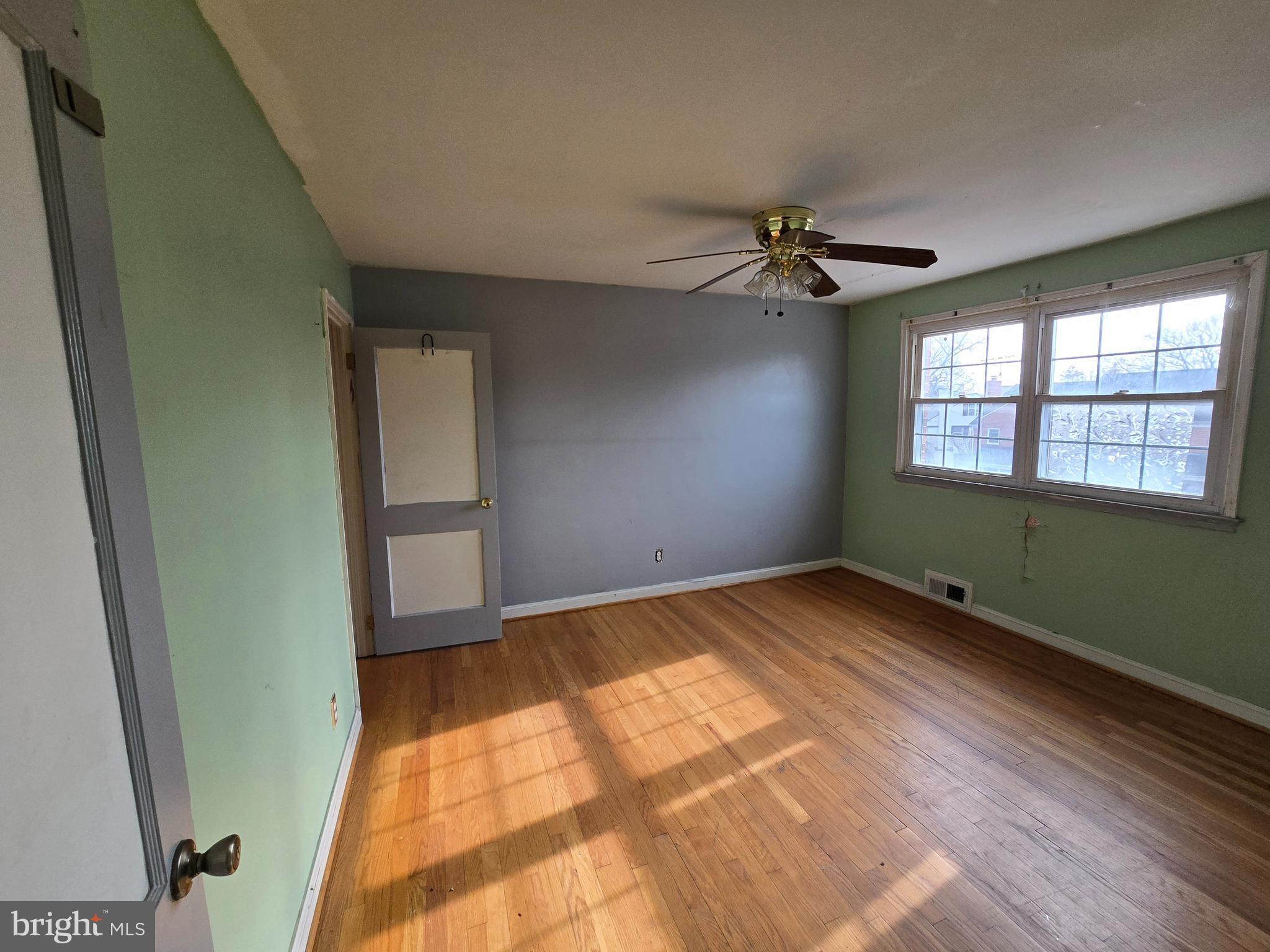 1708 Hartsdale Road Baltimore, MD 21239 - Photo 15 of 26 a view of an empty room and a window