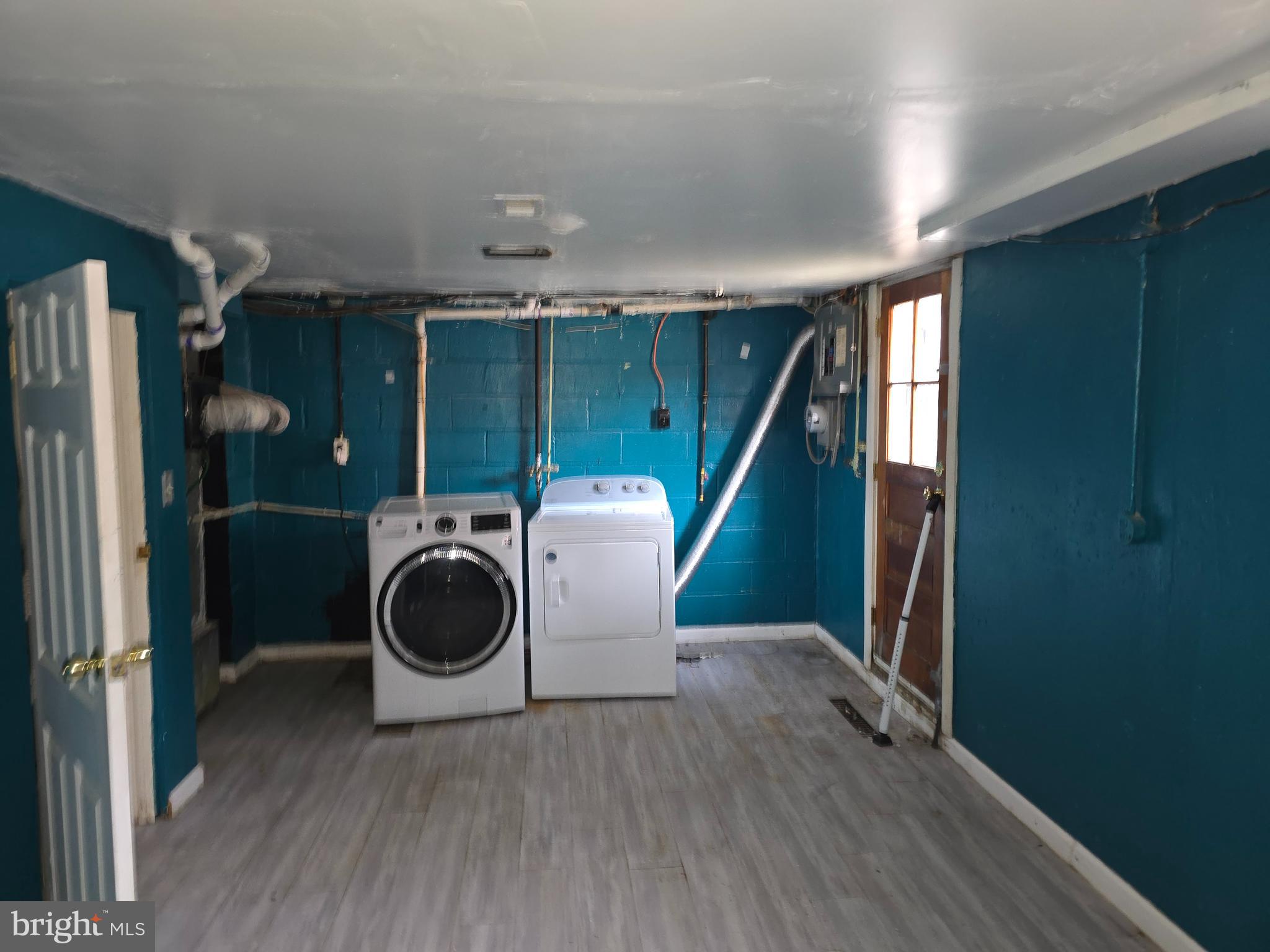 1708 Hartsdale Road Baltimore, MD 21239 - Photo 22 of 26 a utility room with dryer and washer