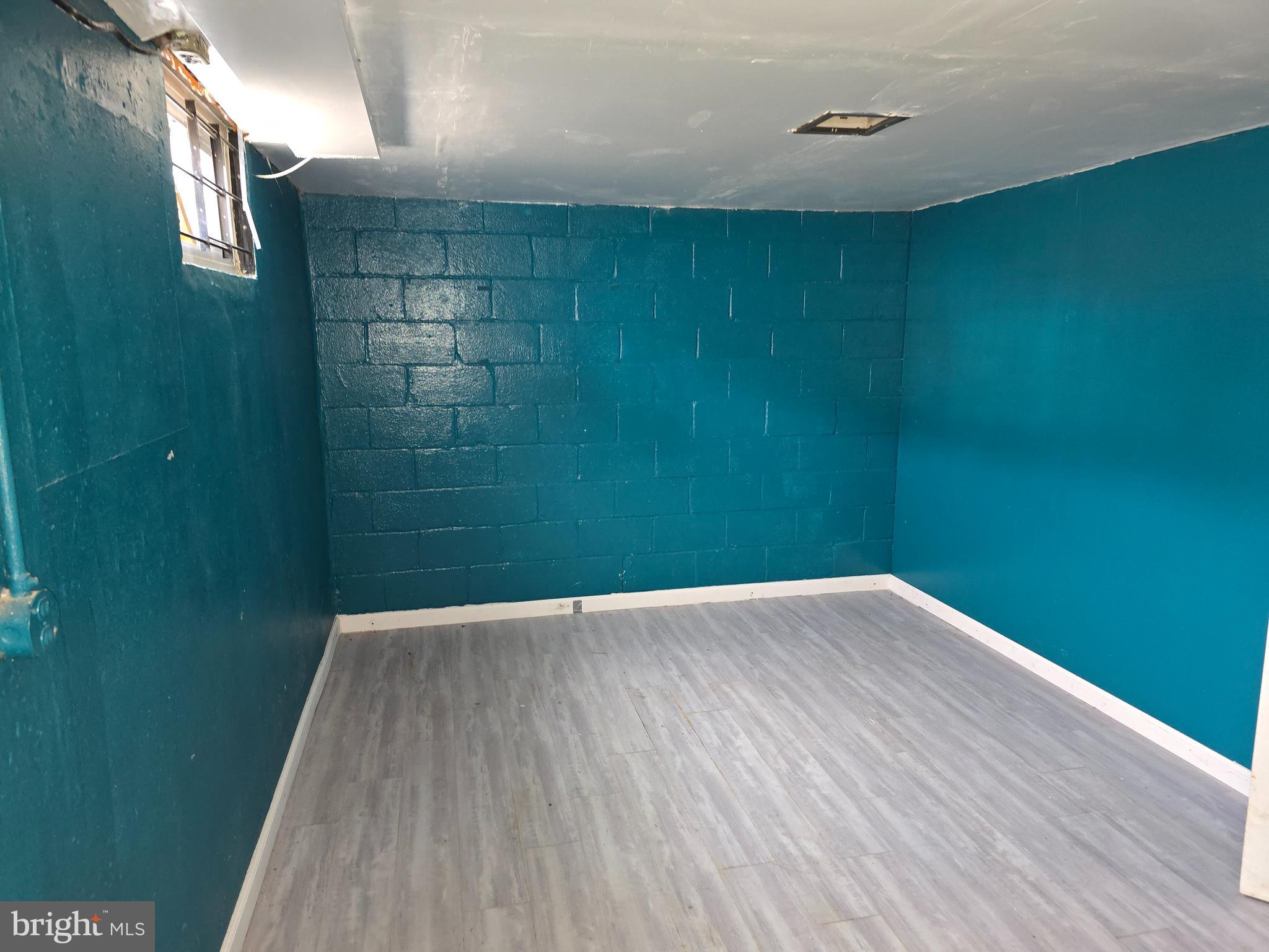 1708 Hartsdale Road Baltimore, MD 21239 - Photo 23 of 26 a view of wooden floor in a bathroom