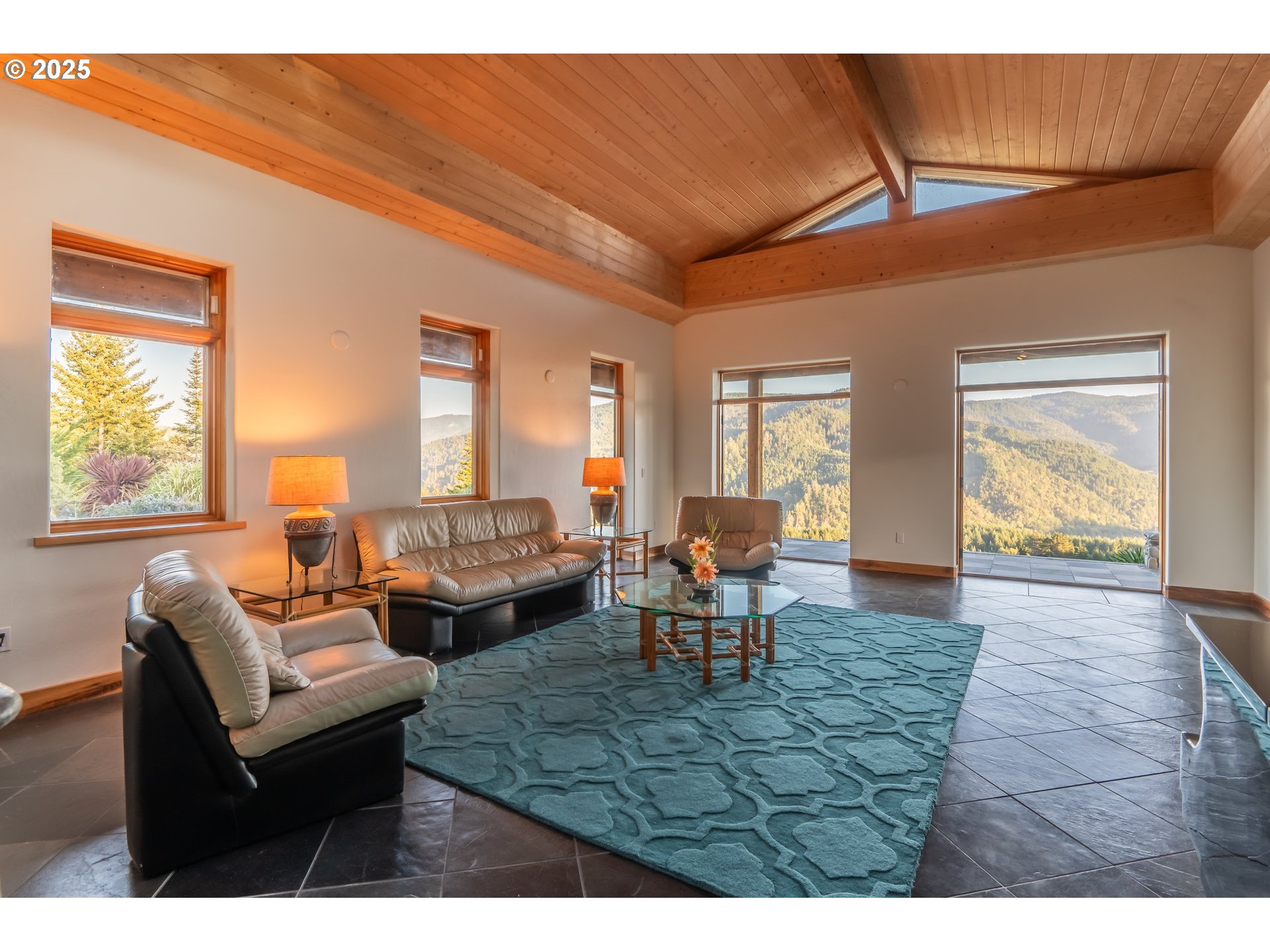 32855 Miller Ranch Road Gold Beach, OR 97444 - Photo 11 of 47 a living room with furniture and a table