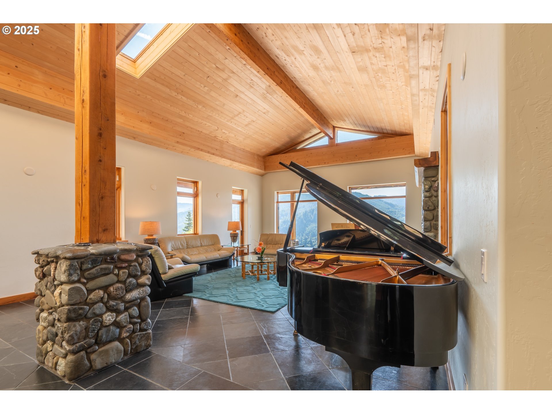 32855 Miller Ranch Road Gold Beach, OR 97444 - Photo 14 of 47 a living room with furniture and stairs
