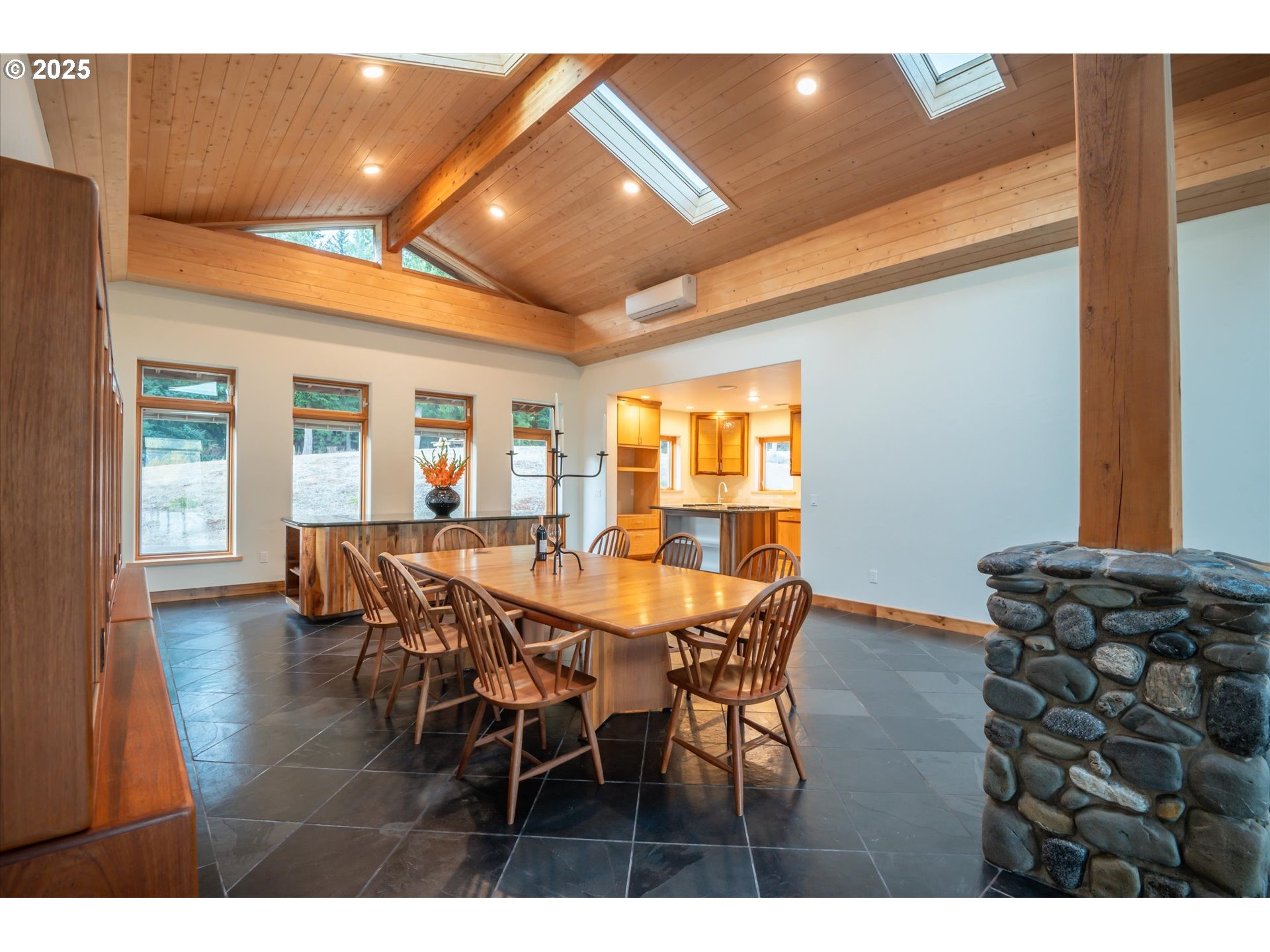 32855 Miller Ranch Road Gold Beach, OR 97444 - Photo 17 of 47 a view of a dining room with furniture and wooden floor