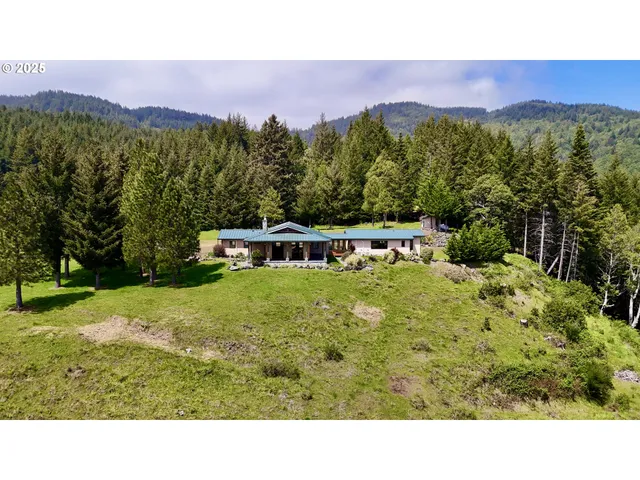 a view of balcony with a yard and mountain view