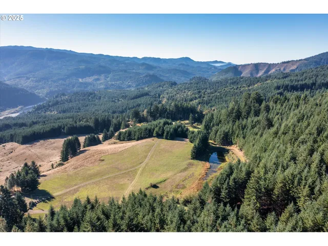 a swimming pool with outdoor seating and yard