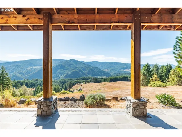 a view of a porch with wooden floor and a porch