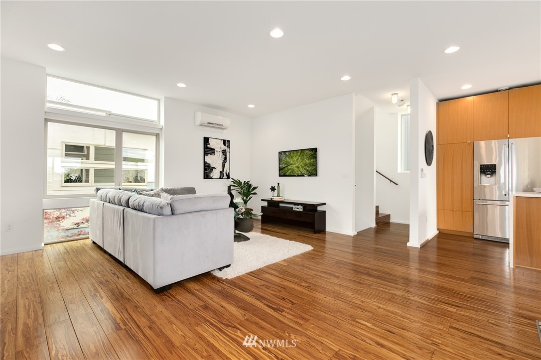 4455 Renton Avenue South Seattle, WA 98108 - Photo 11 of 25 a living room with furniture and a wooden floor