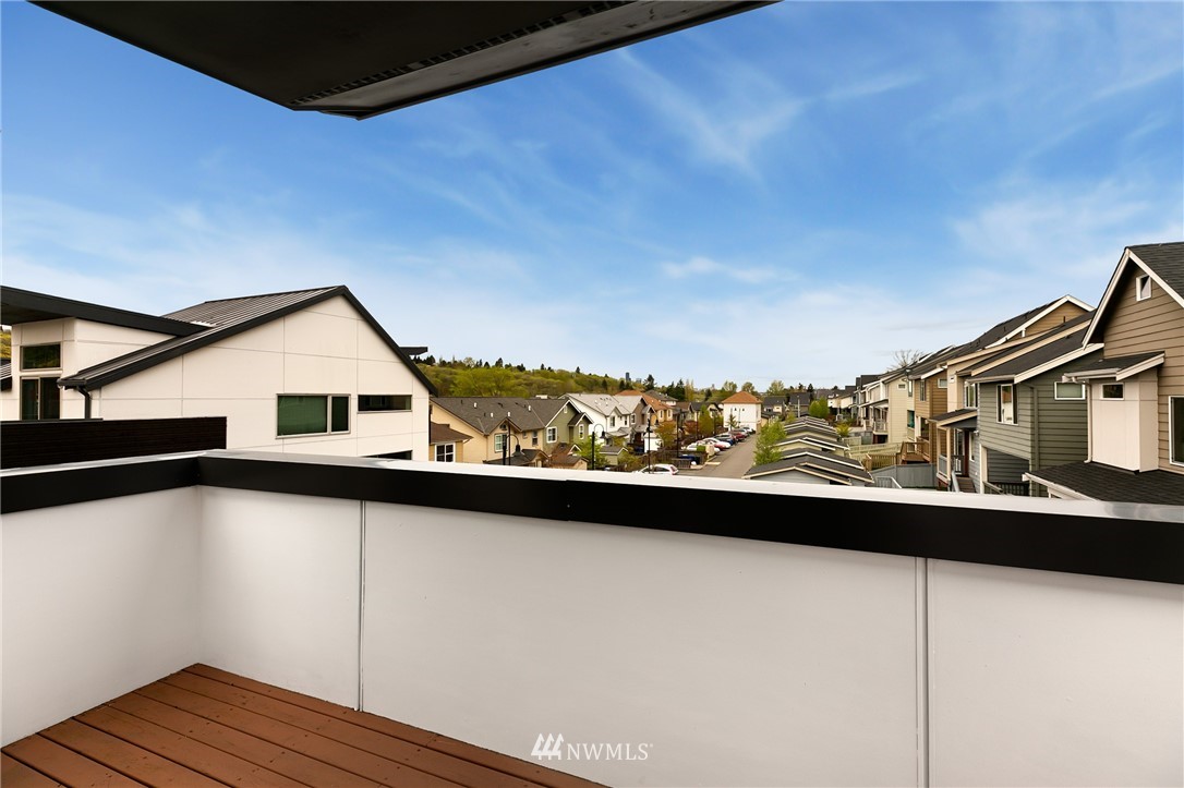 4455 Renton Avenue South Seattle, WA 98108 - Photo 25 of 25 a view of a balcony with wooden floor and fence