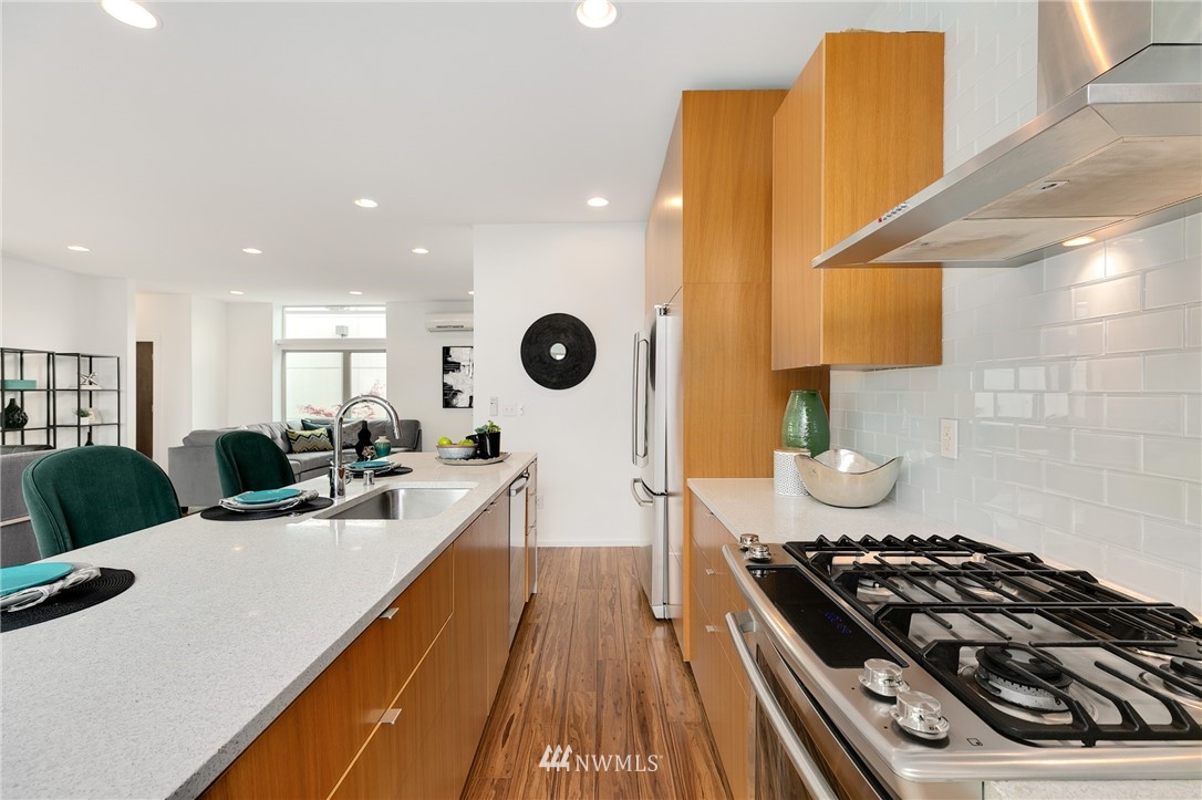 4455 Renton Avenue South Seattle, WA 98108 - Photo 6 of 25 a kitchen with a stove and a refrigerator