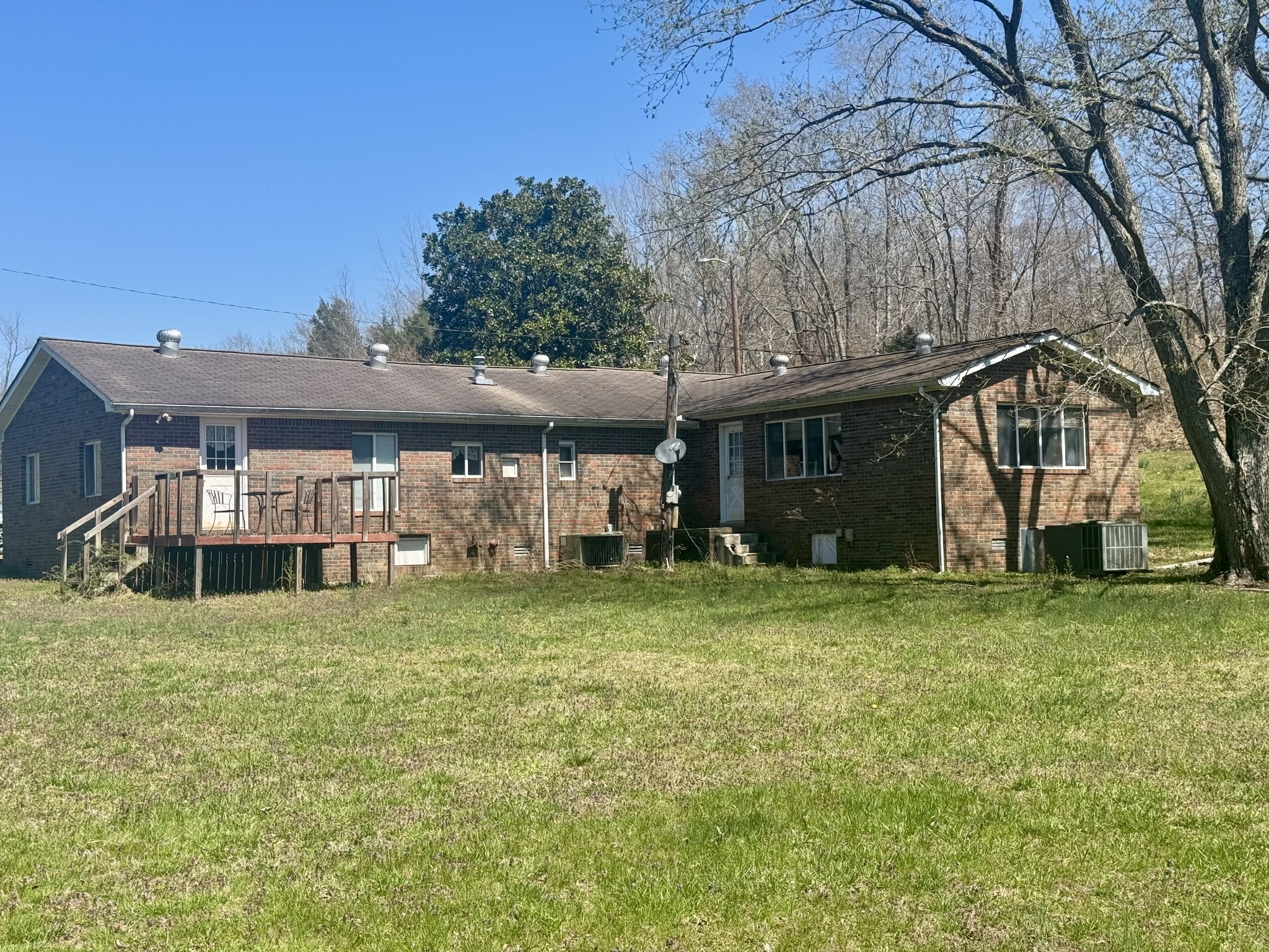 191 Forks Of The River Road Waverly, TN 37185 - Photo 23 of 59 a view of a house with a yard and sitting area