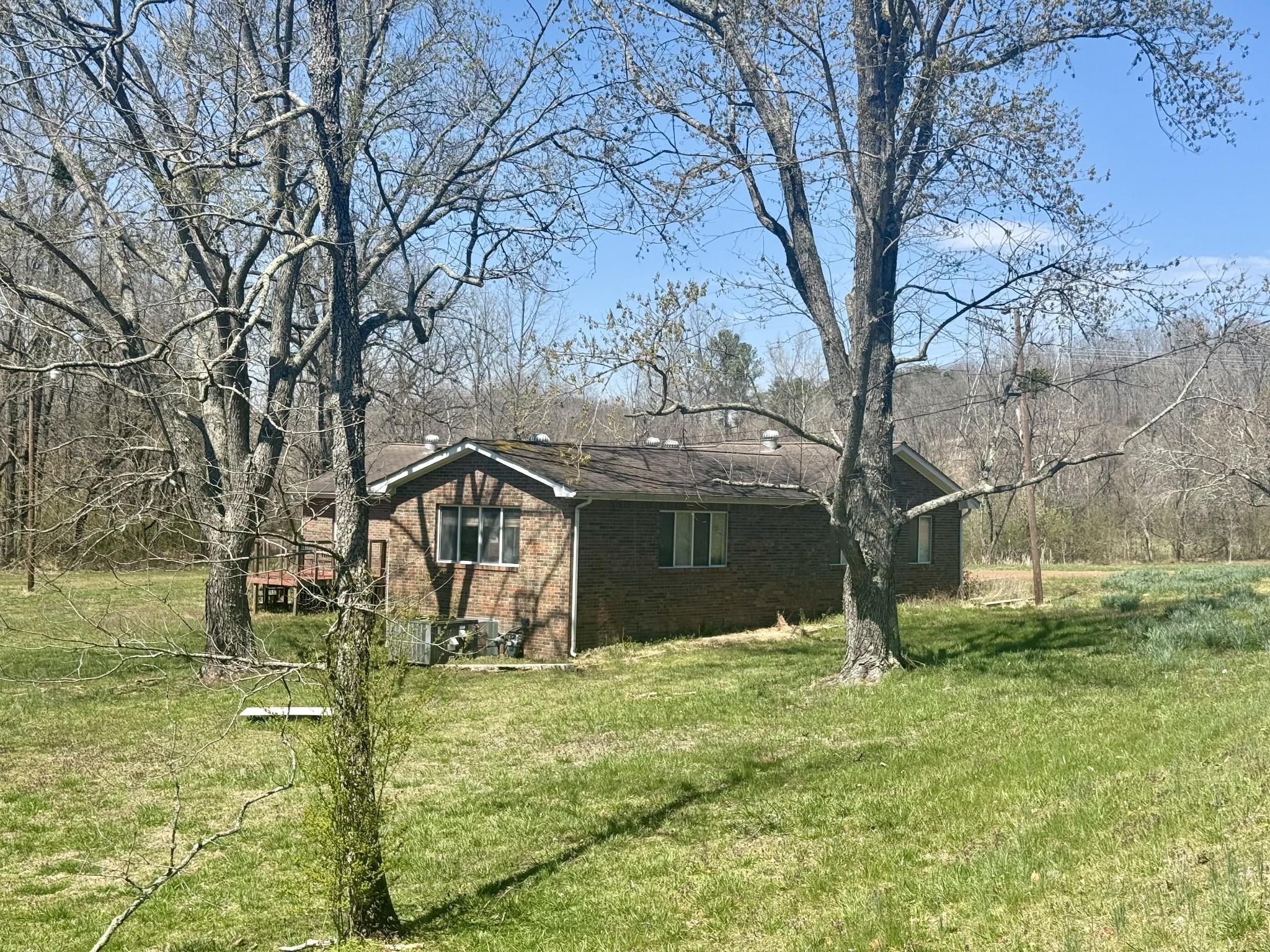 191 Forks Of The River Road Waverly, TN 37185 - Photo 25 of 59 a front view of a house with a yard
