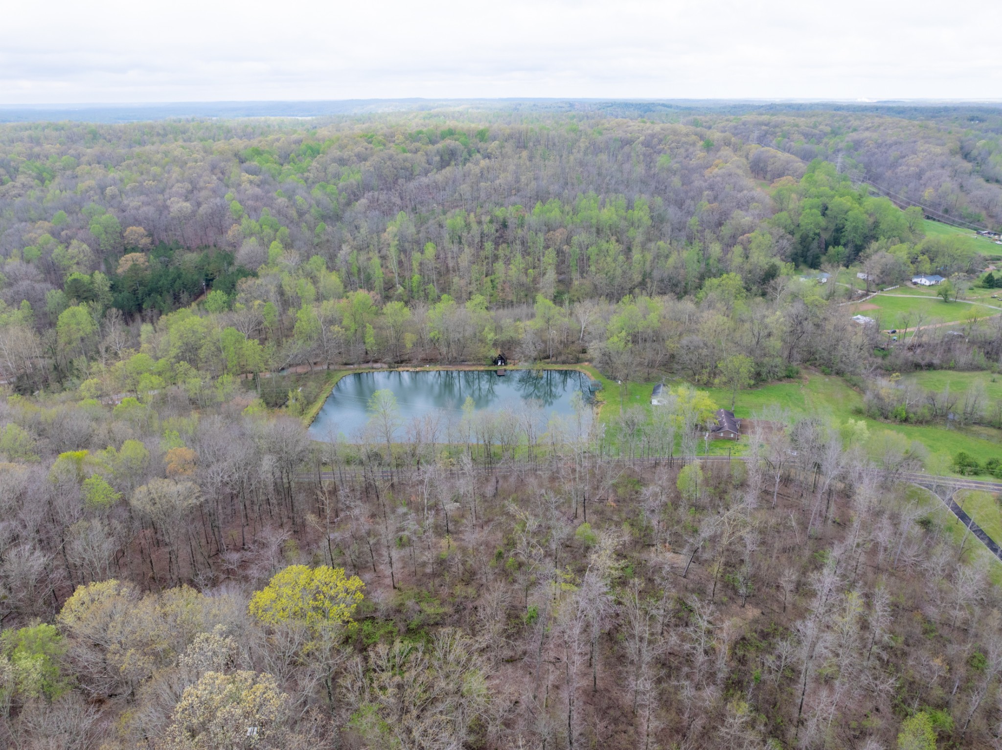 191 Forks Of The River Road Waverly, TN 37185 - Photo 56 of 59 a view of a lake with mountains in the background