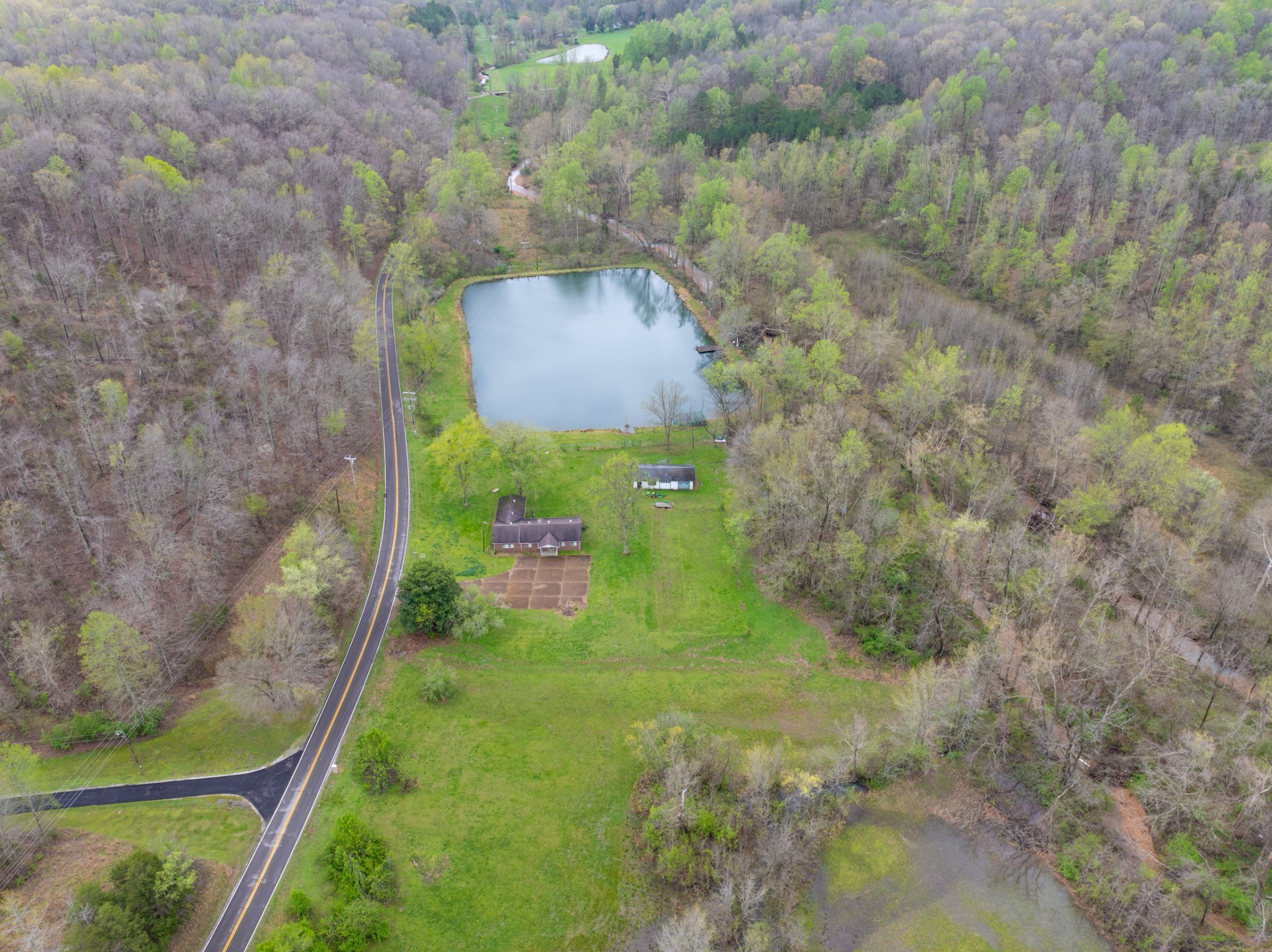 191 Forks Of The River Road Waverly, TN 37185 - Photo 8 of 59 a backyard of a house with lots of green space