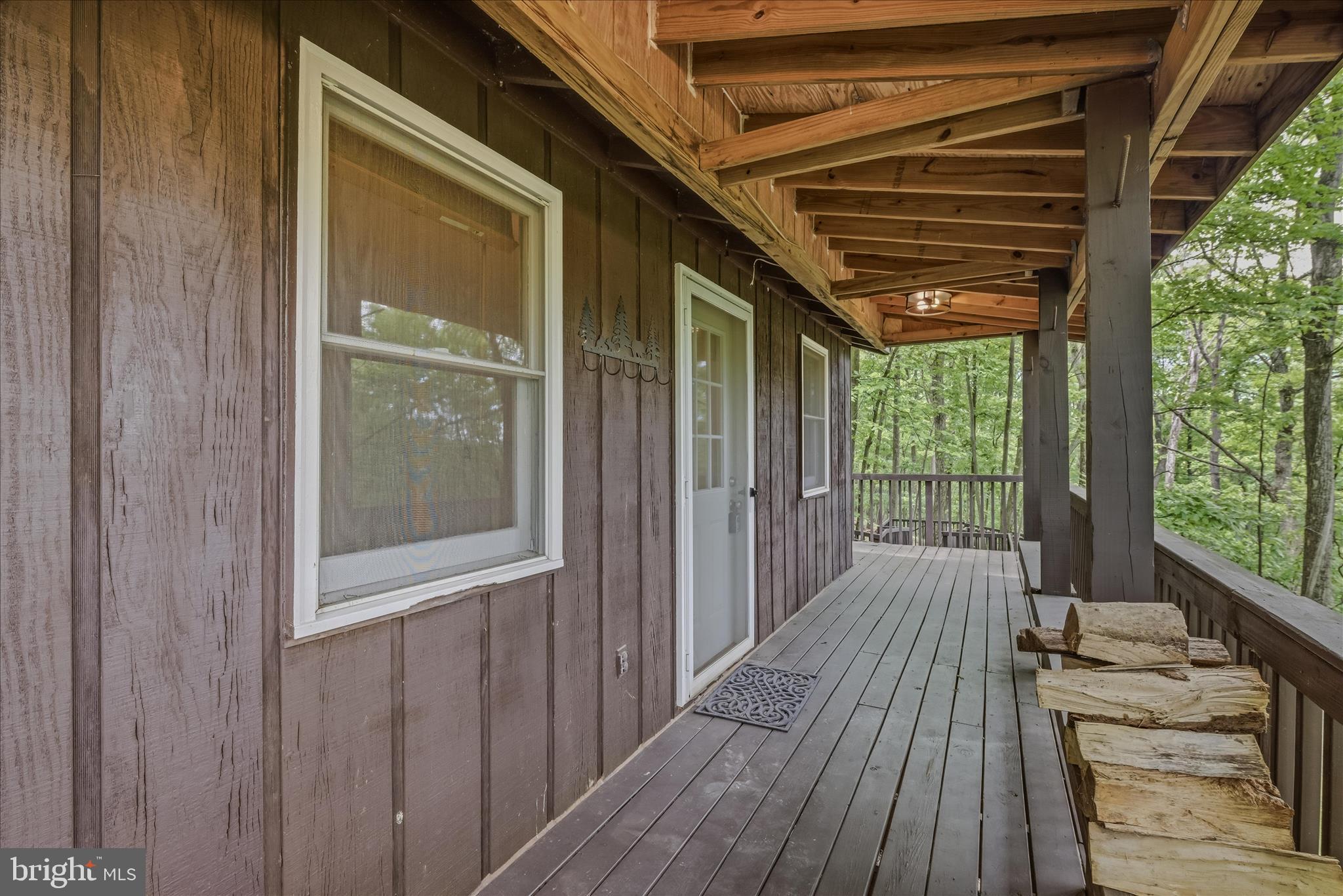 98 Ore Trail Berkeley Springs, WV 25411 - Photo 6 of 46 a view of a balcony with wooden floor