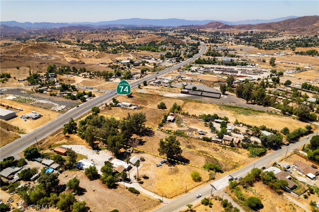 24603 Highway 74 Perris, CA 92570 - Photo 3 of 8 an aerial view of residential houses with outdoor space
