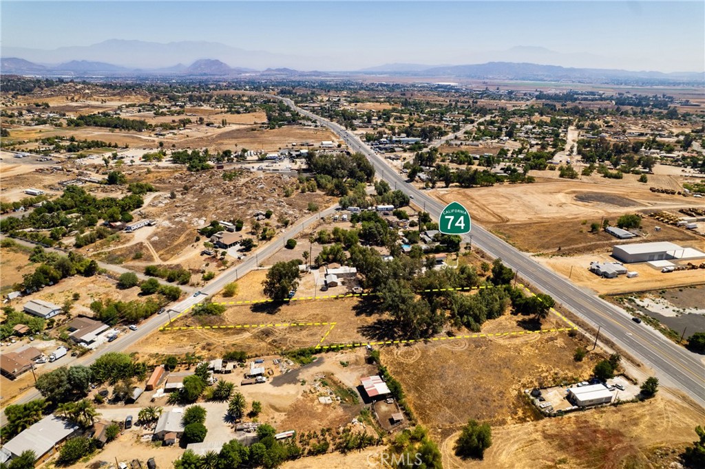 24603 Highway 74 Perris, CA 92570 - Photo 4 of 8 an aerial view of residential houses with outdoor space