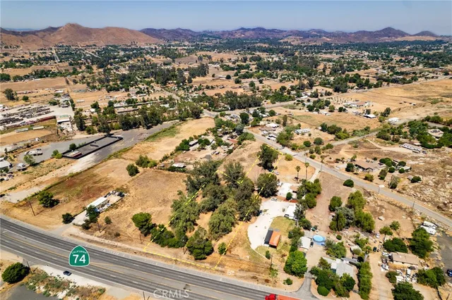 an aerial view of residential houses and city view