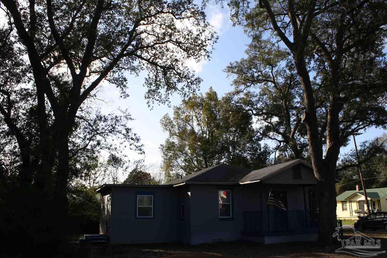 7195 Gillespie Road Milton, FL 32583 - Photo 14 of 14 a view of house with tree in the background