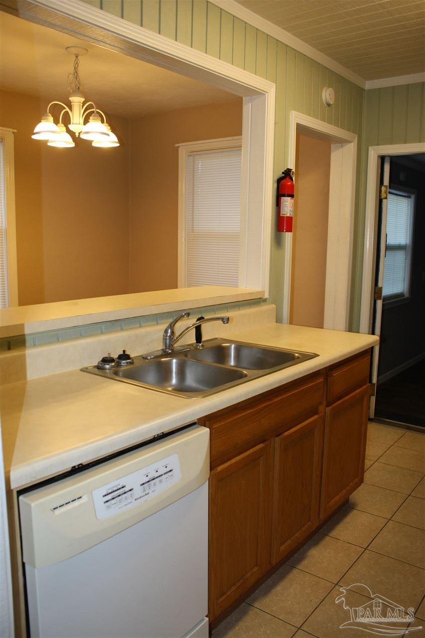 7195 Gillespie Road Milton, FL 32583 - Photo 7 of 14 a bathroom with a sink and a mirror
