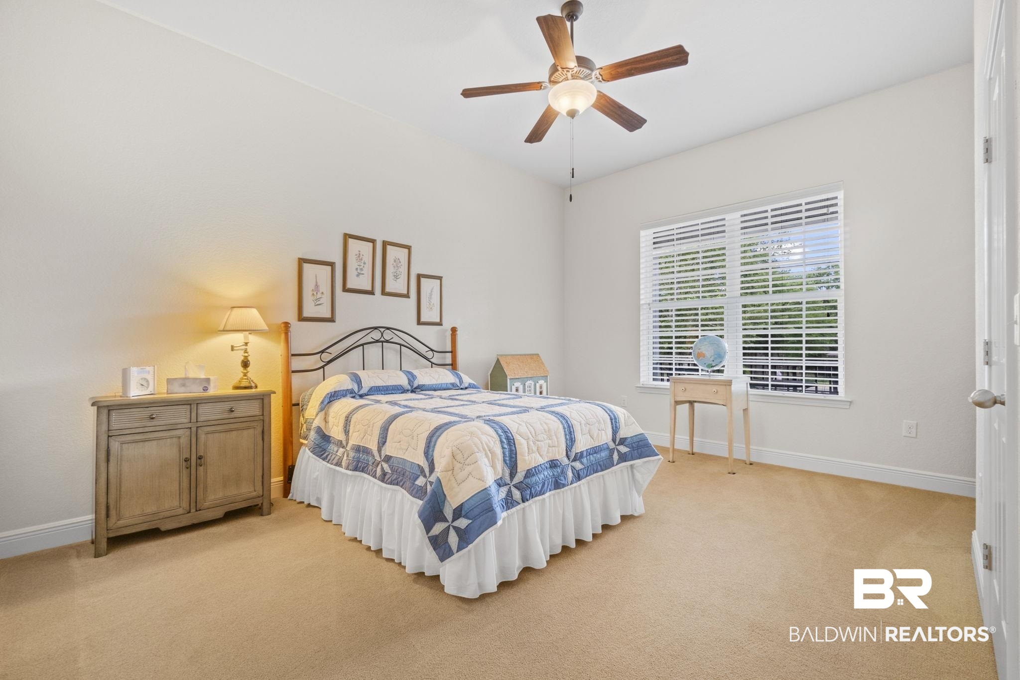 8664 Foxtail Loop Pensacola, FL 32526 - Photo 22 of 64 Bedroom with light carpet, baseboards, and ceiling fan