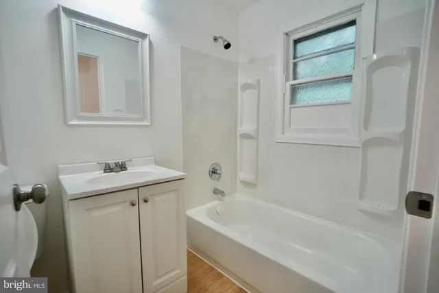 a bathroom with a sink and a bathtub