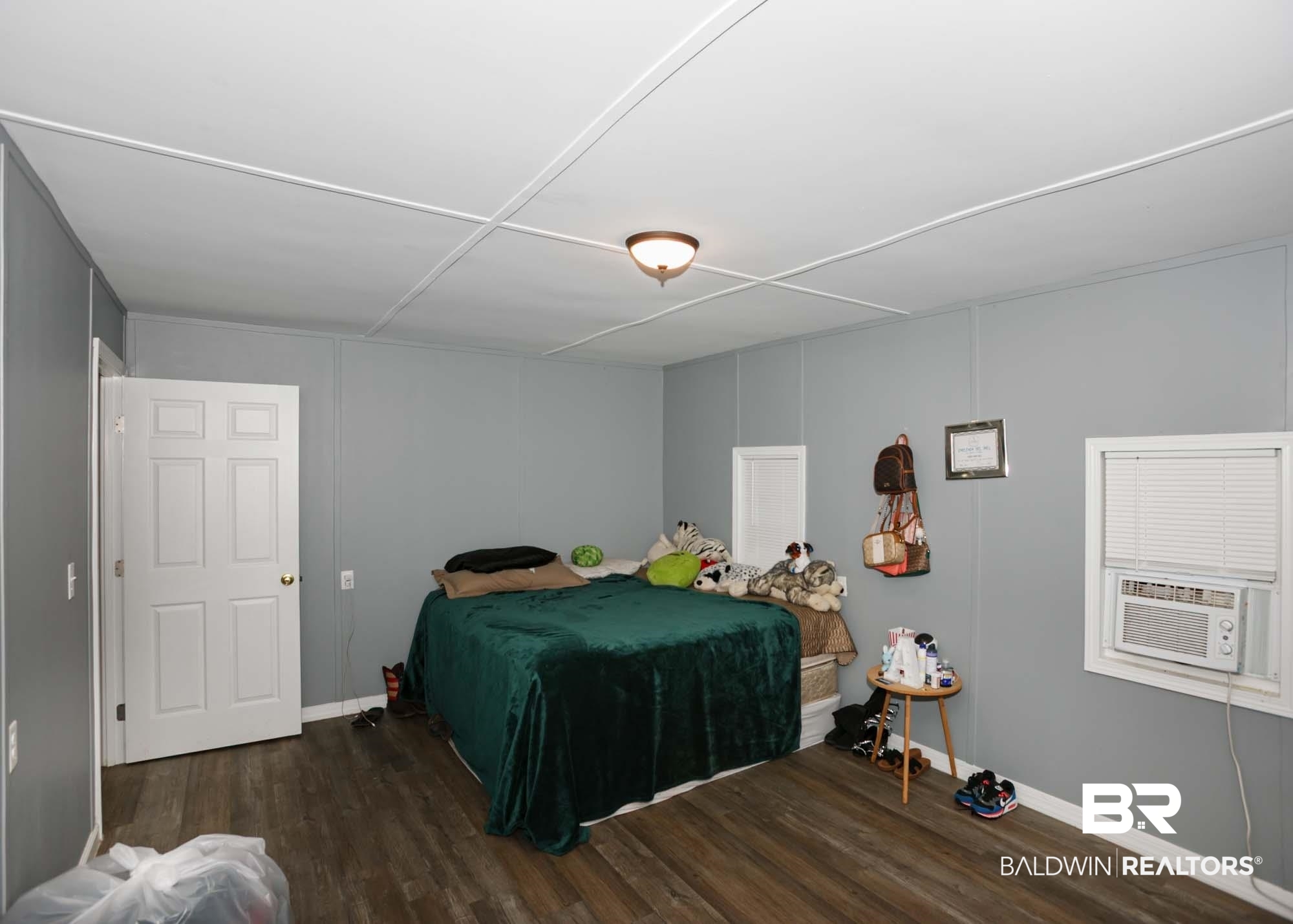 11998 Workman Avenue Foley, AL 36535 - Photo 18 of 59 Bedroom with wood finished floors