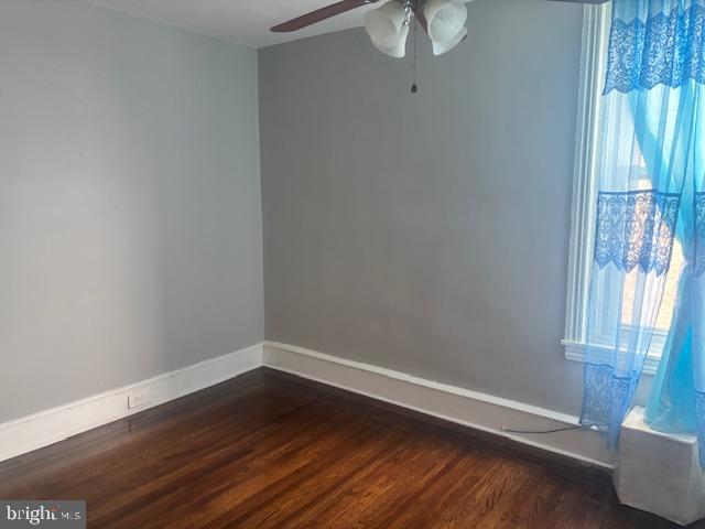 5630 Walnut Street, Unit 2 Philadelphia, PA 19139 - Photo 24 of 28 a view of an empty room with wooden floor and a window