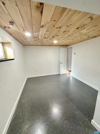 a view of a room with a ceiling fan