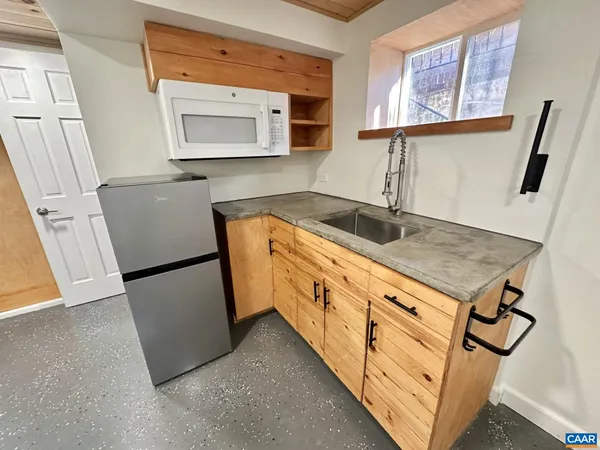 a view of a room with dryer and washer