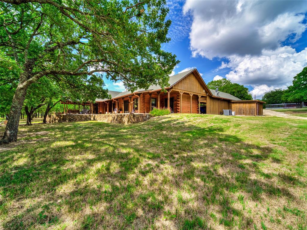 2197 Netherly Lane Forestburg, TX 76239 - Photo 11 of 40 a view of a house with a big yard