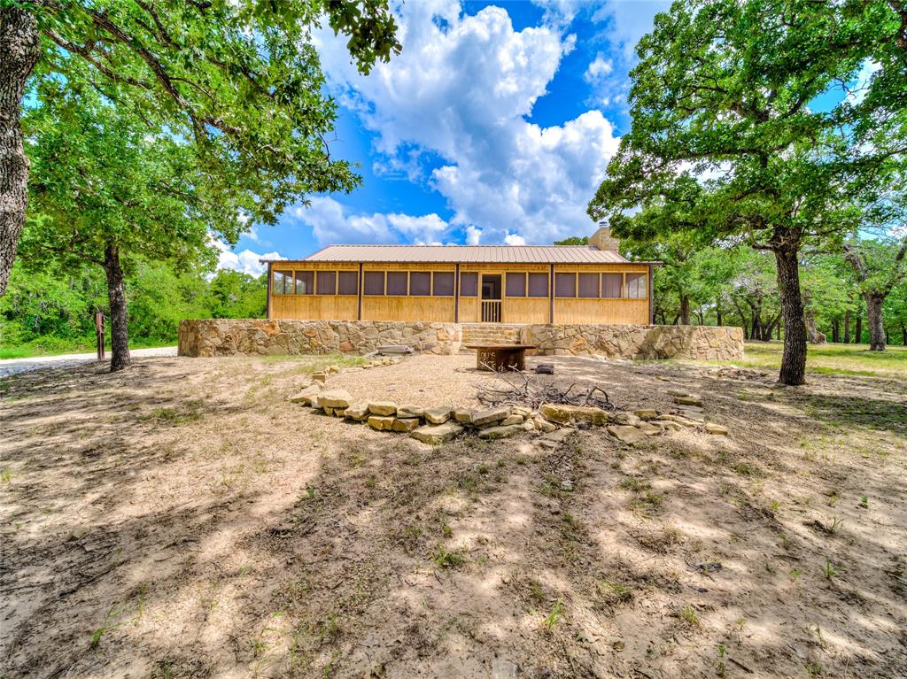 2197 Netherly Lane Forestburg, TX 76239 - Photo 29 of 40 a view of a house with a yard